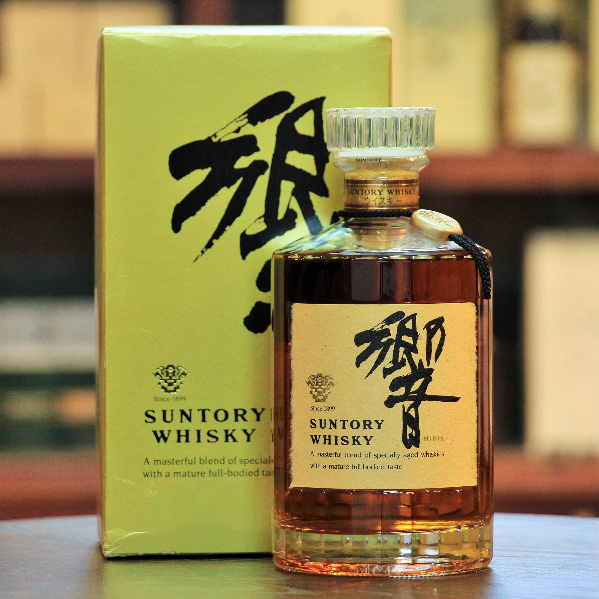 Hibiki Circa 1990 with Box Old Vintage Bottling, A 1990’s bottling (possibly late 80’s) that has no age statement but is supposedly aged 17 years. The name ‘Hibiki’ is written in very small letters on the box and label with “Suntory Whisky” dominating the design instead.