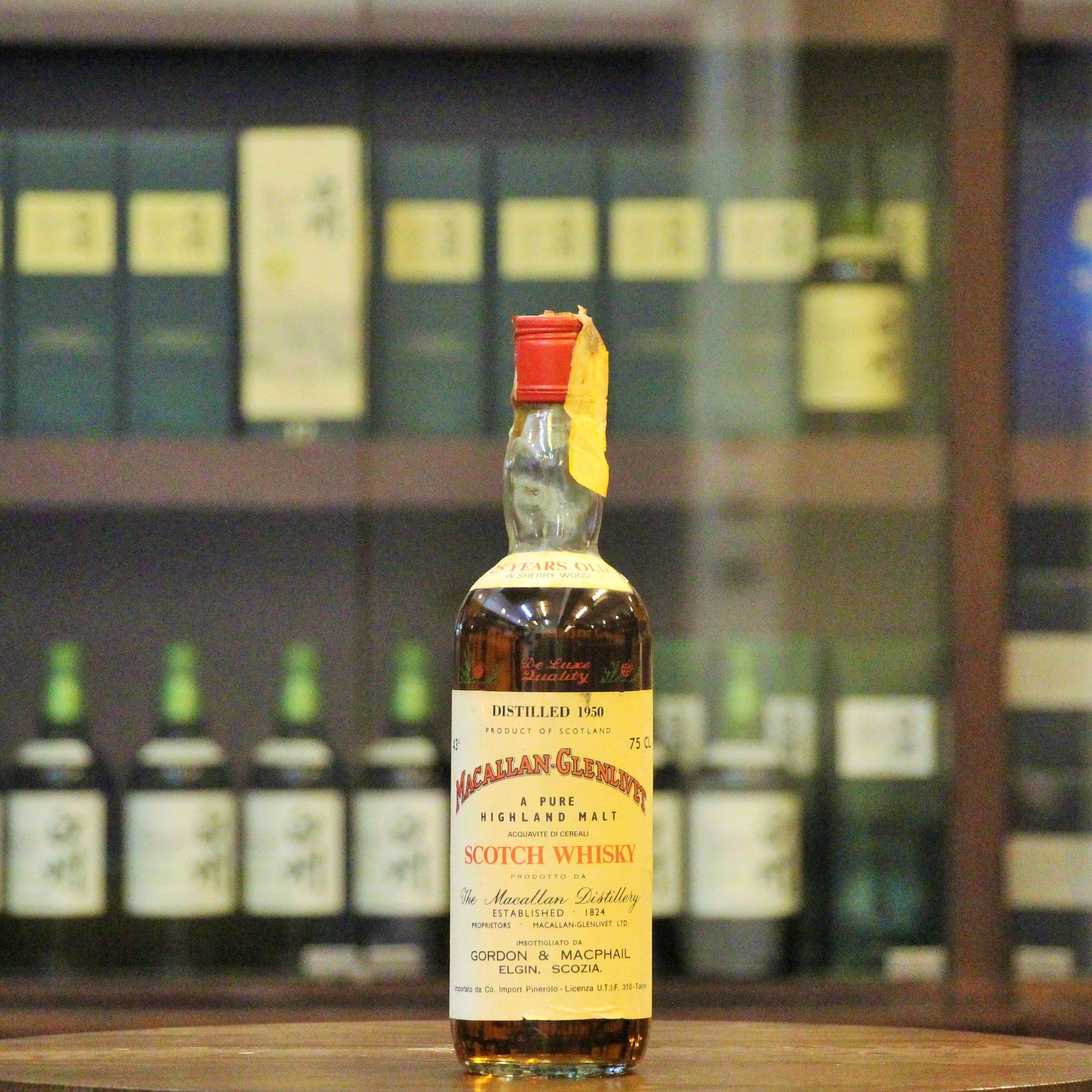 A rare & vintage bottling of Macallan-Glenlivet 25 Year Old distilled in 1950, matured in sherry casks, and bottled by Gordon & MacPhail in late 1970s for Italian importer Pinerolo.