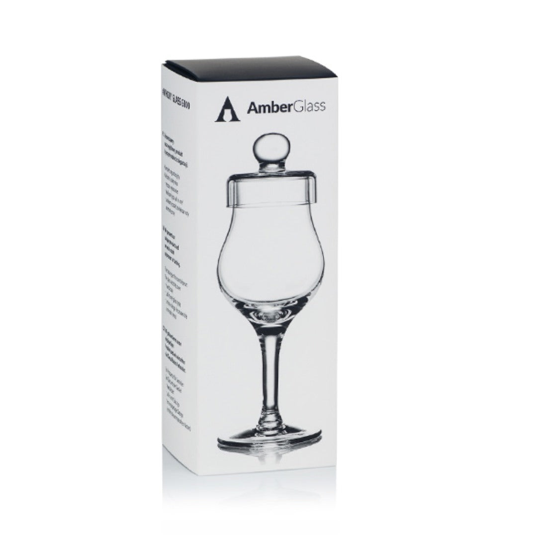 A tulip-shaped, handcrafted glass, slightly modified by our experts. Recommended for heavier peat-smoke whiskies. The tapered mouth nicely concentrates aromas ensuring maximum tasting and nosing satisfaction. Its delicate shape comes from a meticulous glass blowing process. The high, slender stem emphasizes the shape of the bowl. Supplied with a handcrafted matching “outside”&nbsp;cover which prevents evaporation and preserves the aroma. A perfect set for all&nbsp;“water of life” aficionados.&nbsp;Comes wit