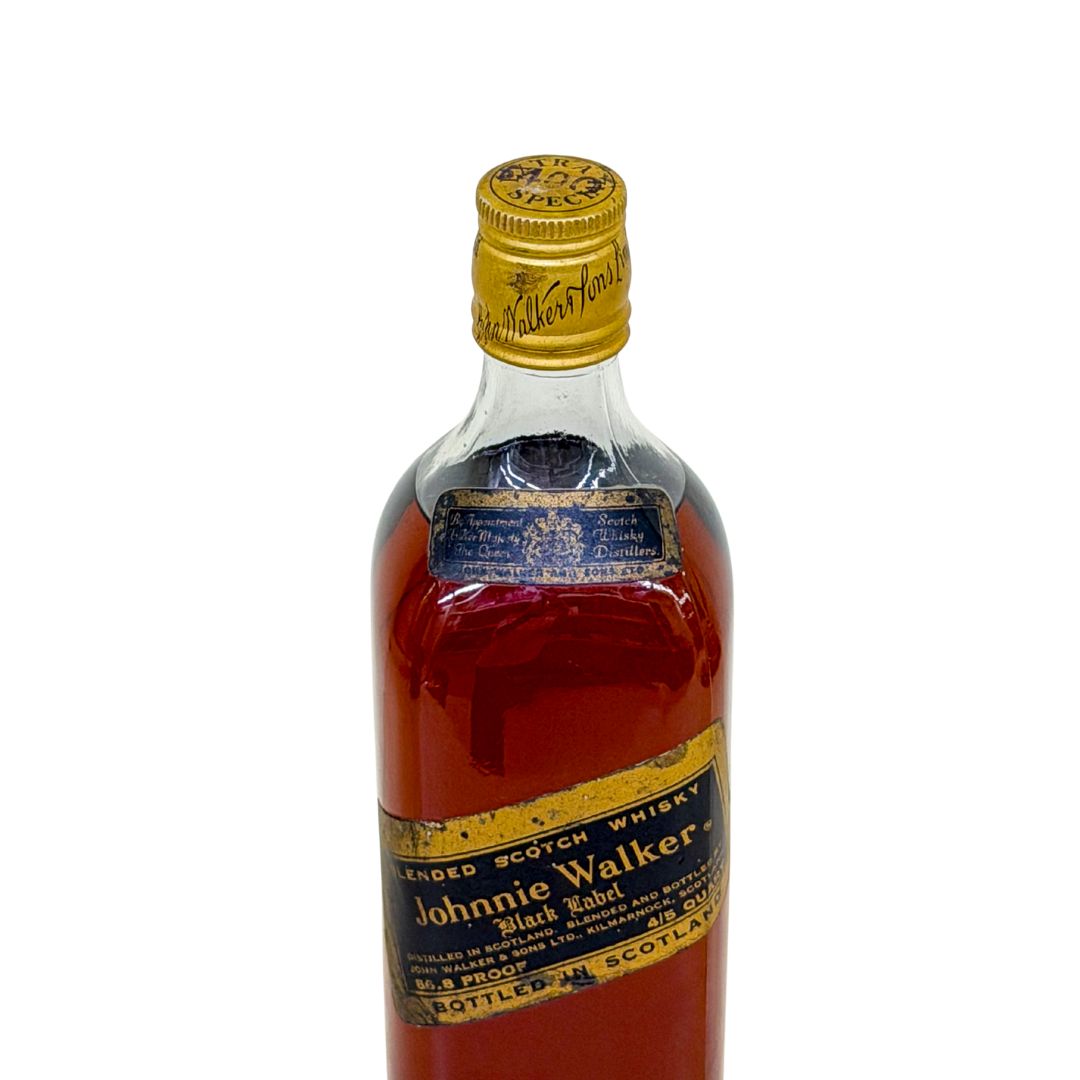 An official US export bottling of Johnnie Walker Black Label 12 Year Old, presented in the historic 4/5-quart format with a strength of 86.8 US proof—equivalent to approximately 43.4% ABV—and a volume of approximately 757 ml. Based on its label, this bottle is likely to date from the 1960s–1970s for US market release.&nbsp;

This vintage Black Label is collectible and historically interesting, particularly for its traditional American-market format and higher bottling strength.&nbsp;
