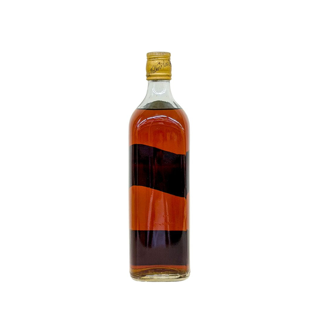 An official US export bottling of Johnnie Walker Black Label 12 Year Old, presented in the historic 4/5-quart format with a strength of 86.8 US proof—equivalent to approximately 43.4% ABV—and a volume of approximately 757 ml. Based on its label, this bottle is likely to date from the 1960s–1970s for US market release.&nbsp;

This vintage Black Label is collectible and historically interesting, particularly for its traditional American-market format and higher bottling strength.&nbsp;
