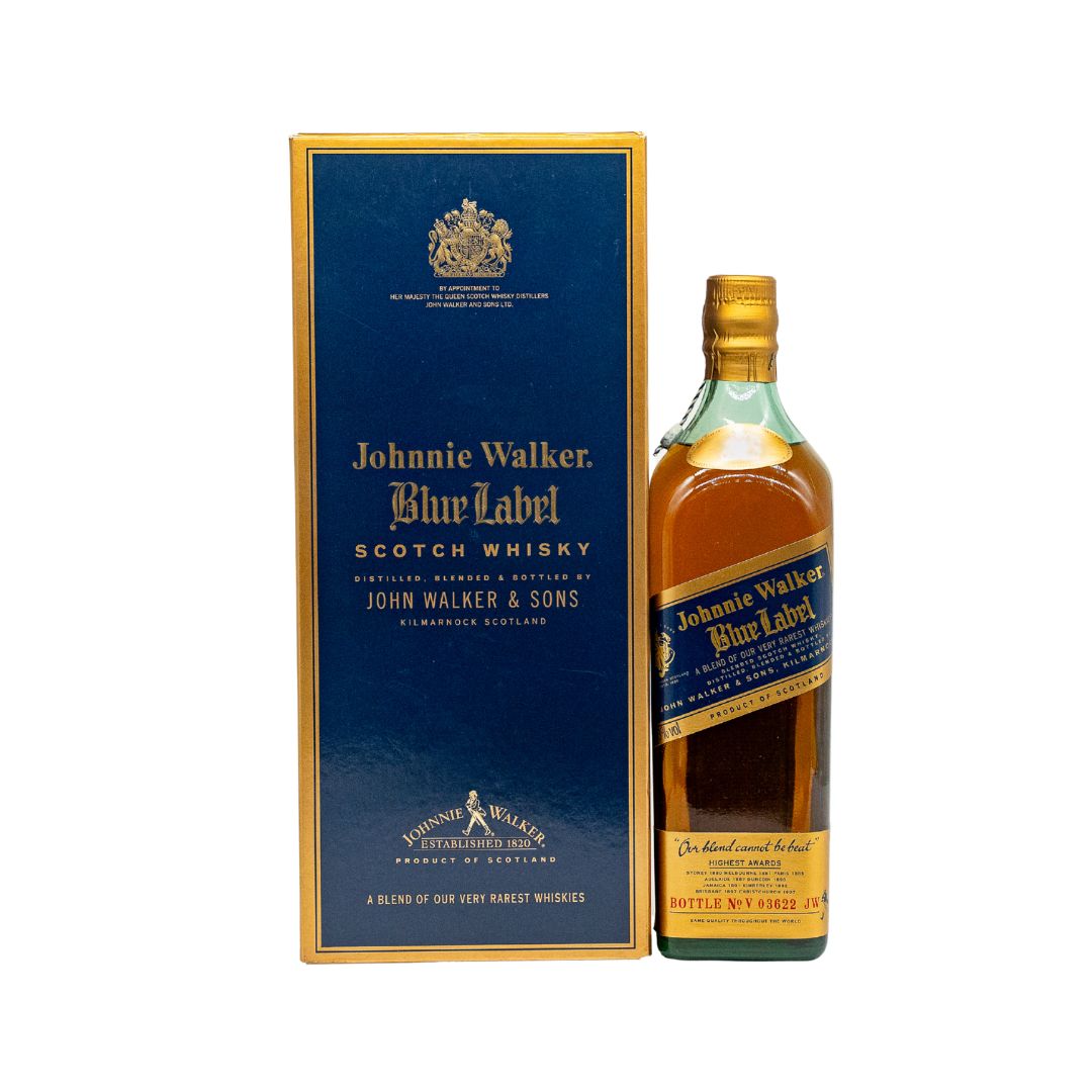 This is an early 1990s bottle of Johnnie Walker Blue Label, originally derived from the ultra‑rare “Johnnie Walker Oldest” blend that preceded the modern Blue Label expression. Blue Label is the ultimate luxury Scotch whisky, and supplies are limited by the rarity and expense of the whiskies used in the blend. Around 15 other mature and precious whiskies are added to balance Blue Label perfectly—“a blend that cannot be beat” (Alexander Walker, 1888). The label carries the Royal Warrant by Appointment to HM 