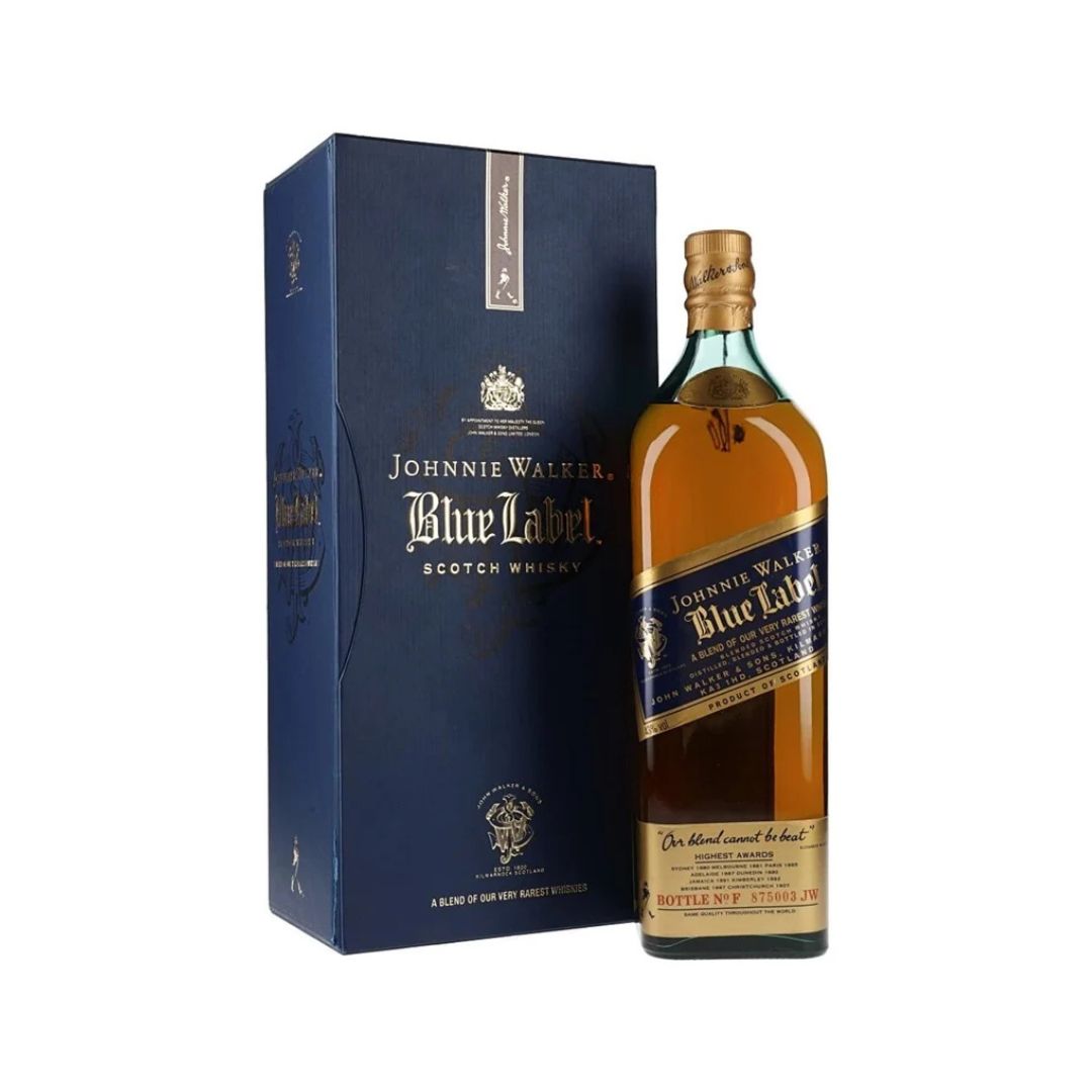 An older release from the 1990s of Johnnie Walker Blue Label Scotch Blended Whisky bottled at a higher ABV of 43%. This is a premium Scotch whisky known for its rich, smooth, and complex flavor profile. It is a blend of some of the exceptional whiskies in the Johnnie Walker reserves, crafted to deliver a luxurious and refined drinking experience.
