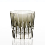 A Whiskey Glass in subtle black unique to KAGAMI. In contrast to simple design from side view, its bottom is adorned with fine precise cutting, which will take you to a kaleidoscopic world when the glass is tilted.