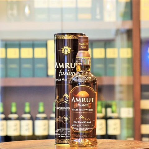 First released in 2009, this Single Malt Whisky from the Amrut Distillery in Bangalore India, is distilled from a mix of barley grown in India and peated barley imported from Scotland - hence the name FUSION. Nose : Oak spices with sweet malty notes and subtle smoke. Palate: Gentle smoke gradually evolving into more peat smoke at the back along with vanilla custard and seemingly rich dark fruits developing into into a really intense chocolate fudge