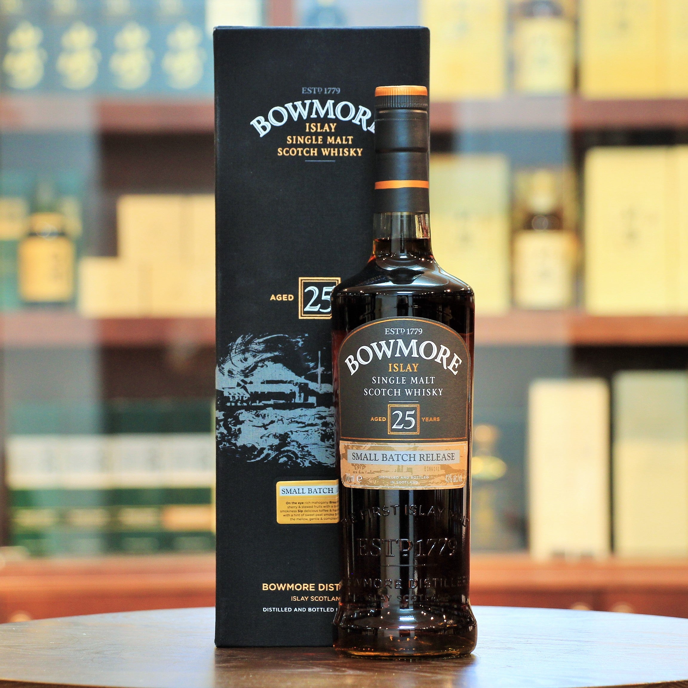 Bowmore 25 Years Old Small Batch Release, An excellent aged and well balanced bottling, with notes of mandarin peel combined with dry fruit richness and subtle peat smoke.  