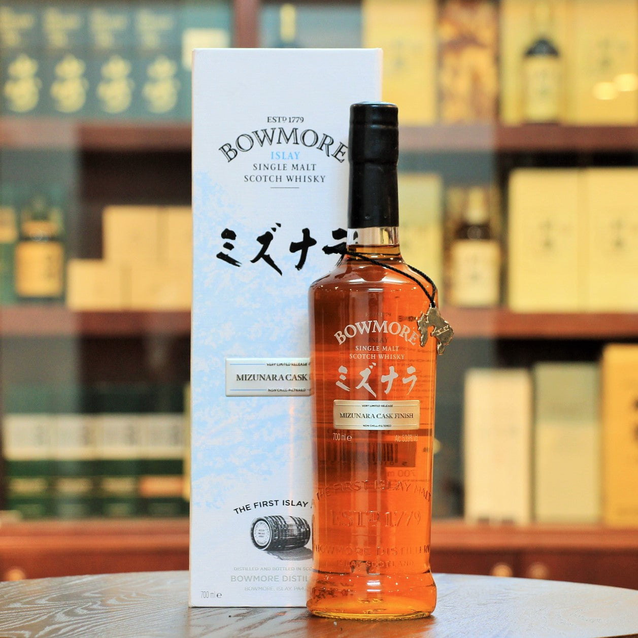 Bowmore Mizunara Cask Single Malt Whisky Limited Edition, Bowmore Official Tasting Notes (Website) for this bottling. Color: Warm amber Nose: Spicy, mellow sweetness carried on a fresh ocean breeze Palate : Sweet vanilla, cedar wood, exotic mango and honey rose blossom Finish: Floral spice and fragrant smoke. Only 2000 bottles were released in 2015.