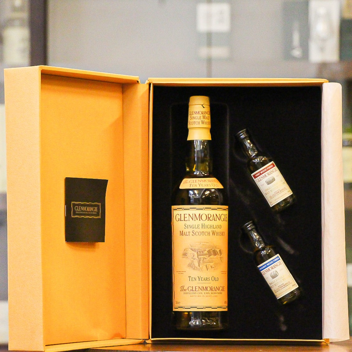 An older bottling of the 10 Year old Single Malt Whisky from the 1990s (our estimate) from this Highland distillery of GLenmorangie in a gift set, which also includes a 5cl of Burgundy Wood Finish and a 5cl of Port Wood Finish.