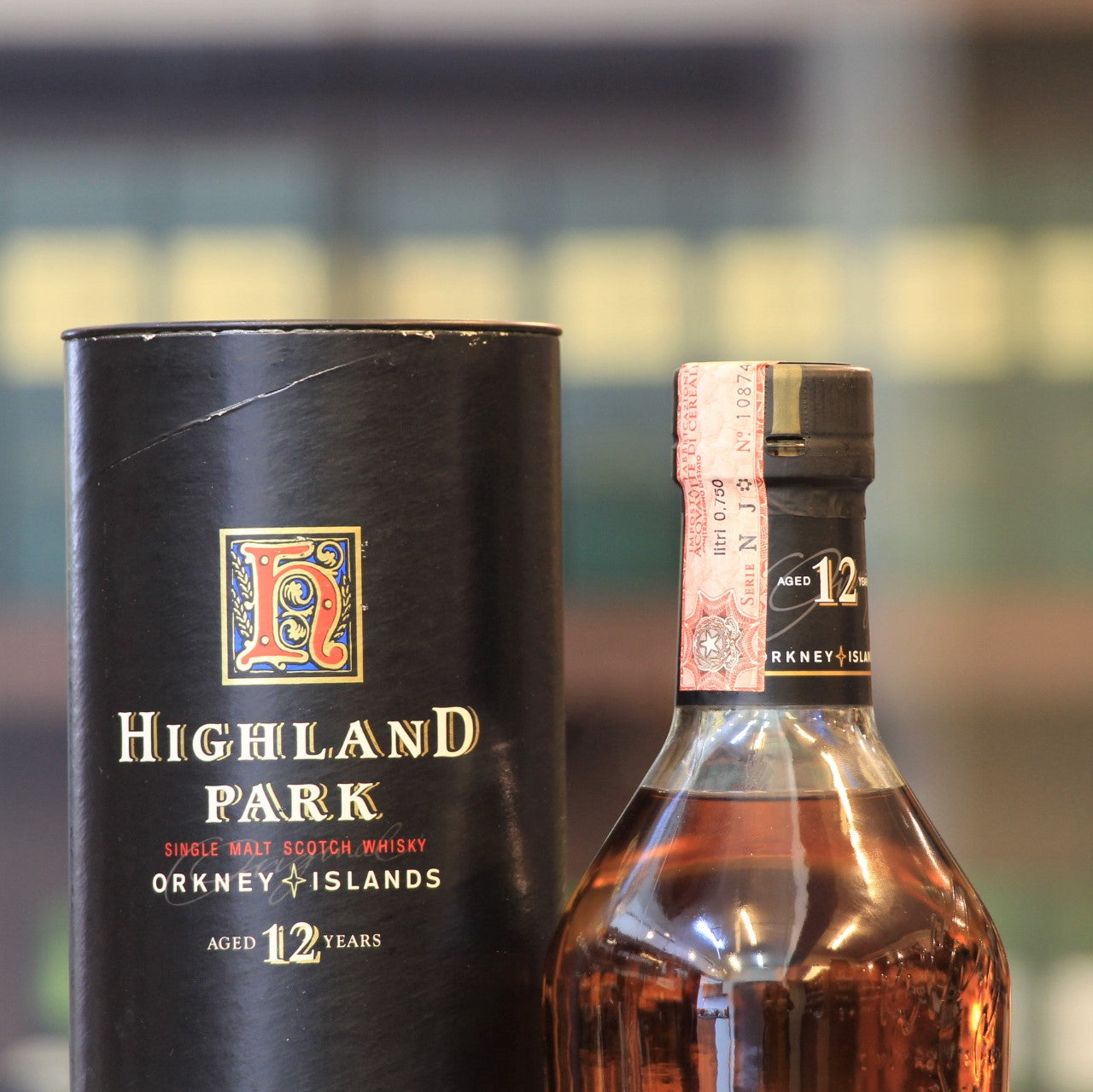 A 12 years old bottling from Highland Park bottled during the 1990s in a dumpy styled bottle and a paper label. A rare bottle to find. This old bottling is a unique balance of subtle smokiness and heather-honey sweetness. Whisky writer Michael Jackson had commented about these old Highland Park 12 year olds as 'The greatest all-rounder in the world of malt whisky'. This has been bottled at 43%.