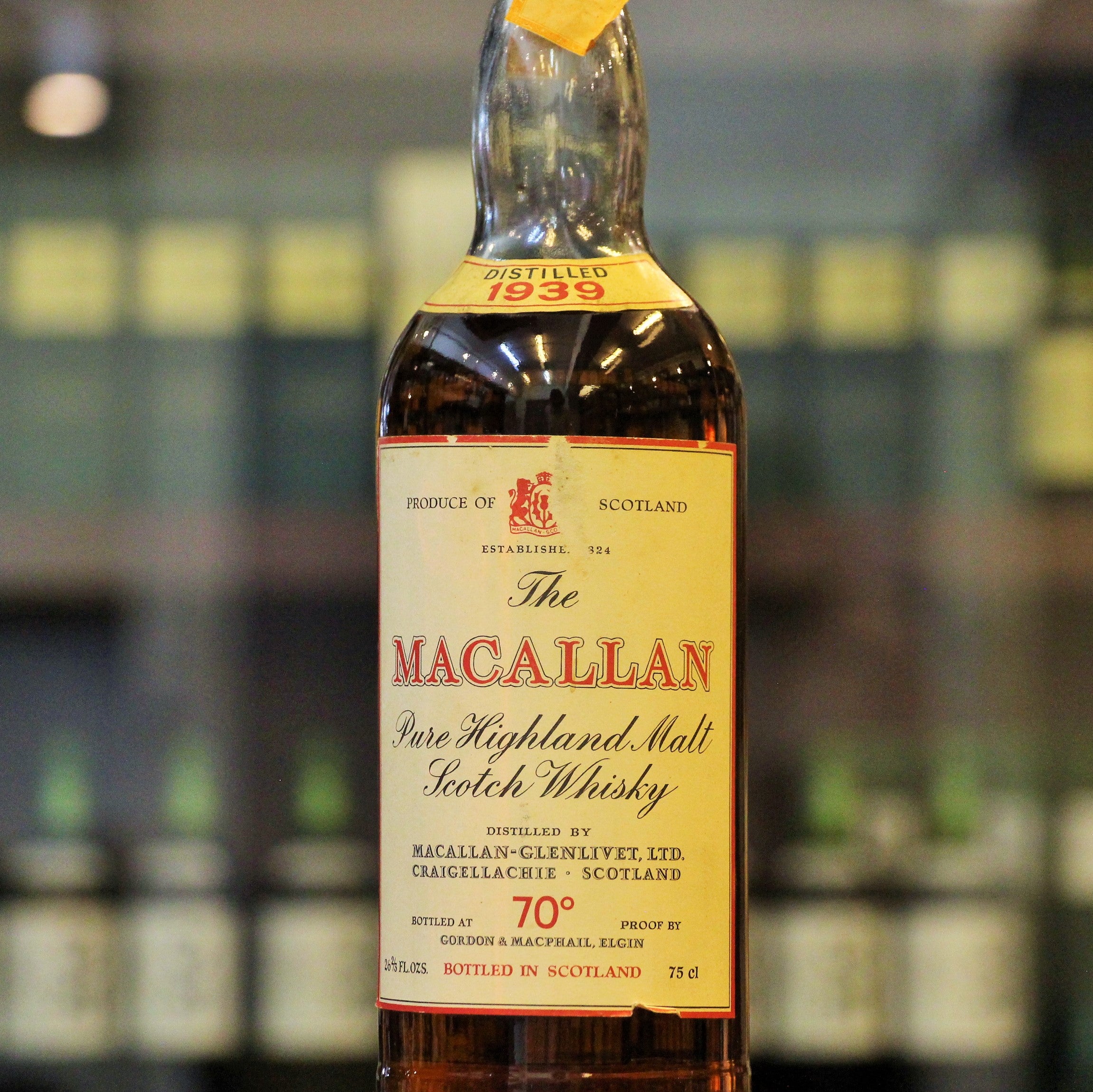 The company mostly used the classic "Macallan-Glenlivet" label, but on occasions used this aesthetic "The Macallan" and more synonymous with Campbell, Hope & King, and favoured by the distillery itself when it took over in 1980. Images of actual bottle. No Box is Available. Sold in "As Is" Condition.