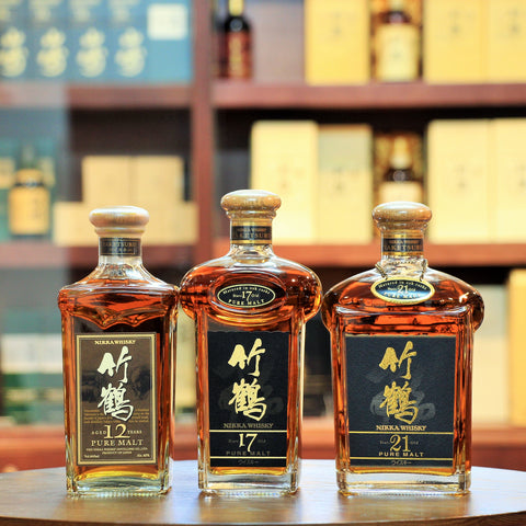 Nikka Taketsuru Vintage Set Pure Malt Whisky (12,17,21), A vintage set of 3 bottlings aged 12, 17 & 21 years. Comes with their original gift boxes. Boxes are a bit scratched and slightly damaged. Bottlings are sold in "as is" condition.