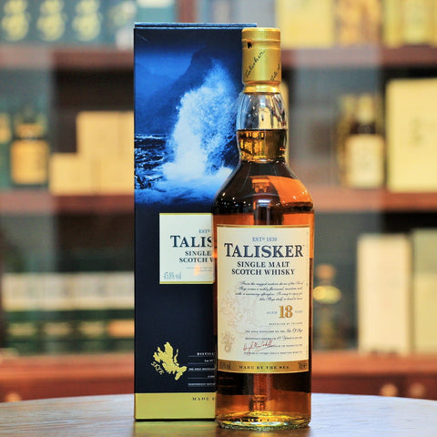 Talisker 18 Years Single Malt Scotch Whisky, Awarded the 'Best Single Malt Whisky in the World' at the World Whiskies Awards in 2007. A great balance between peat, spices such as black pepper and sweetness. Color: Amber 